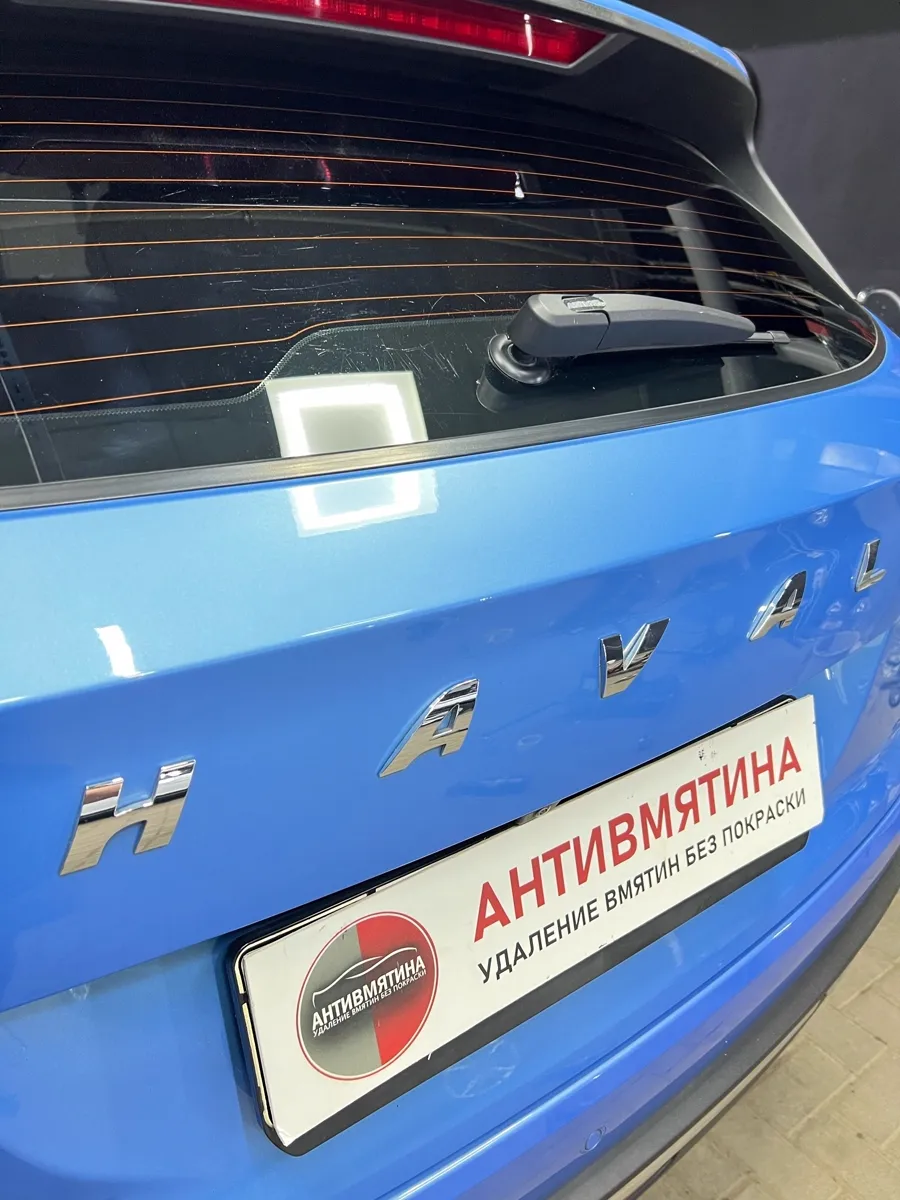 Крышка багажника Haval после беспокрасочного удаления вмятины